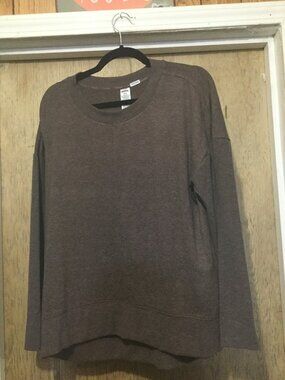 RBX super soft sweater brown in color size medium 23 inches across